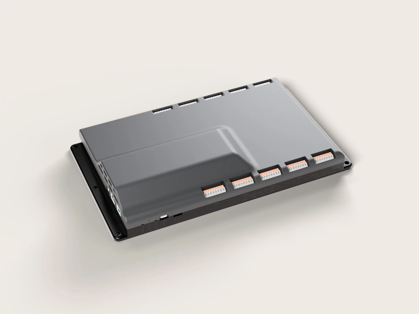 The Cyber Shields Node in its graphite aluminium enclosure, seen from above, with connector banks along both long sides.